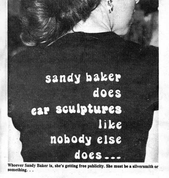 Sandy's T-shirt design reflects her sense of humor and was an instant conversation piece. The press caption read: Whoever Sandy Baker is, she's getting free publicity. She must be a silversmith or something.