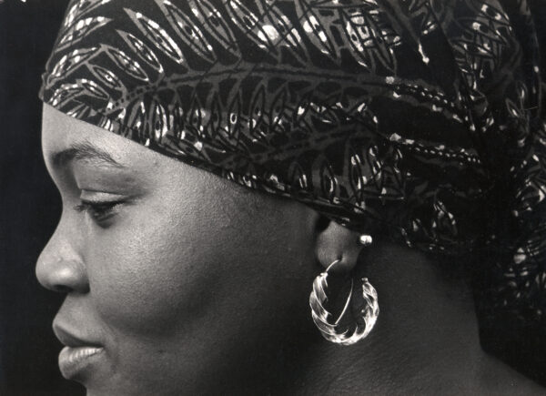 Sandy wearing her Mali Twist Earrings. She made her own path in the jewelry industry. A Shawn Walker photo.