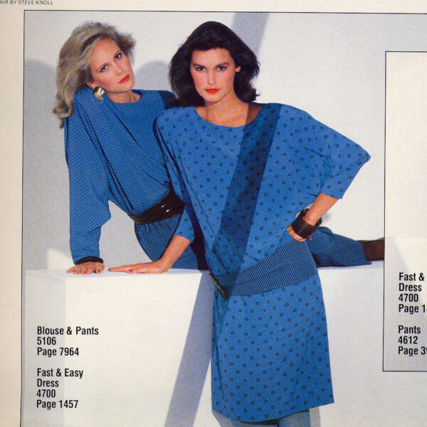 Sandy's earrings on a pattern book page.