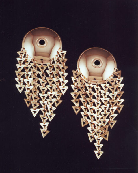 Her love of movement and attention to detail appear with these super-sized MAMBO Earrings.
