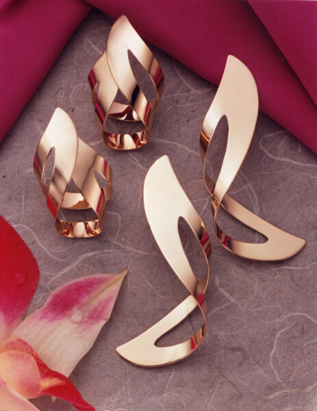 Her Turban and Sasha Earrings. Sculptural designs distinctive to the Baker brand.