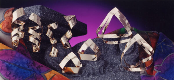 Faceted earrings in a folded, angular geometry.